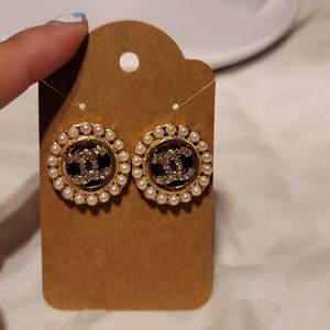 Gold stud earrings